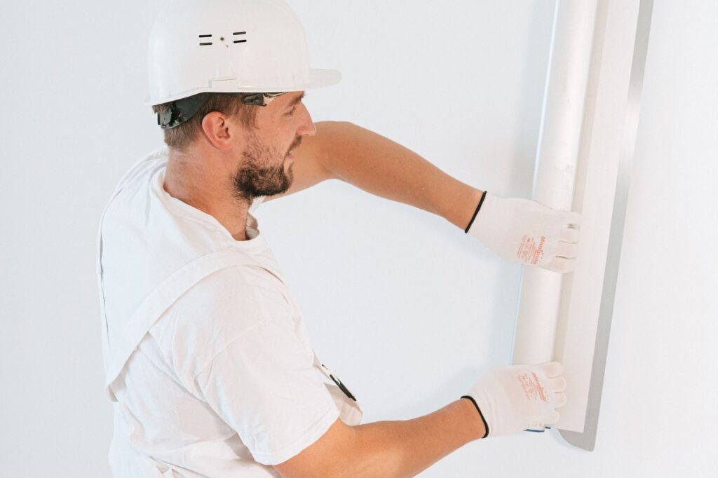 Handyman patching drywall
